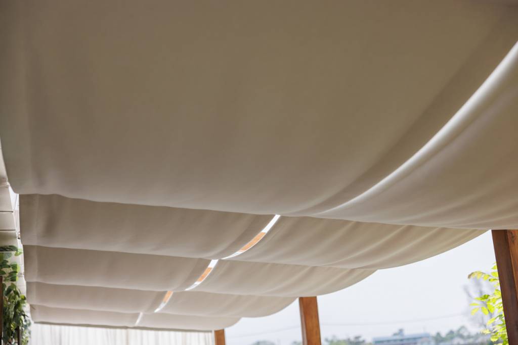protection solaire toile voile ombrage pergola jardin terrasse